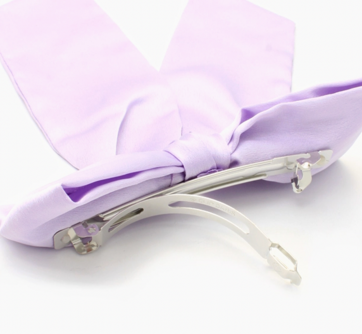 Molly & Rose statement lilac hair accessory; one 13cm satin bow with approximately 19cm tails attached to a 10cm barrette clip