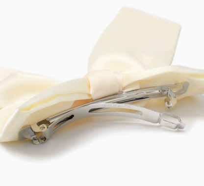 Molly & Rose large ivory hair bow product image; elegant decorative clip for occasion hairstyles and dressing up