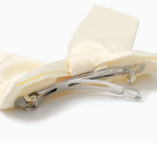 Molly & Rose large ivory hair bow product image; elegant decorative clip for occasion hairstyles and dressing up