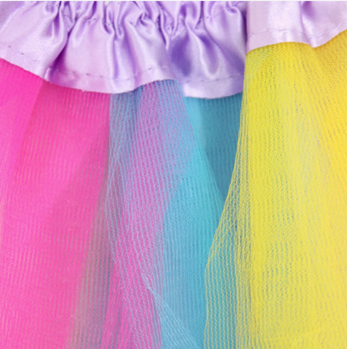 Molly & Rose unicorn dress-up accessories shown separately; gold horn aliceband has glittery ears and pastel flowers, beside shiny gold wings with elastic straps