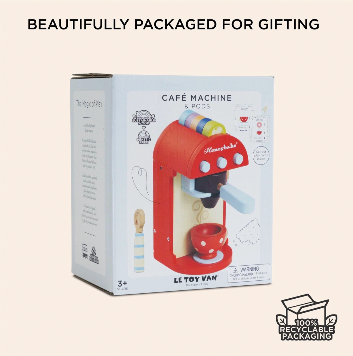 Pretend play coffee-making set by Le Toy Van, featuring a wooden machine, coffee pods, removable portafilter and milk frother.