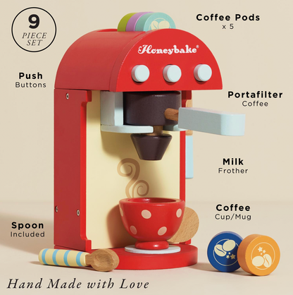 Wooden Coffee Machine & Pods by Le Toy Van, a play-kitchen café set with a painted cup and spoon for stirring.