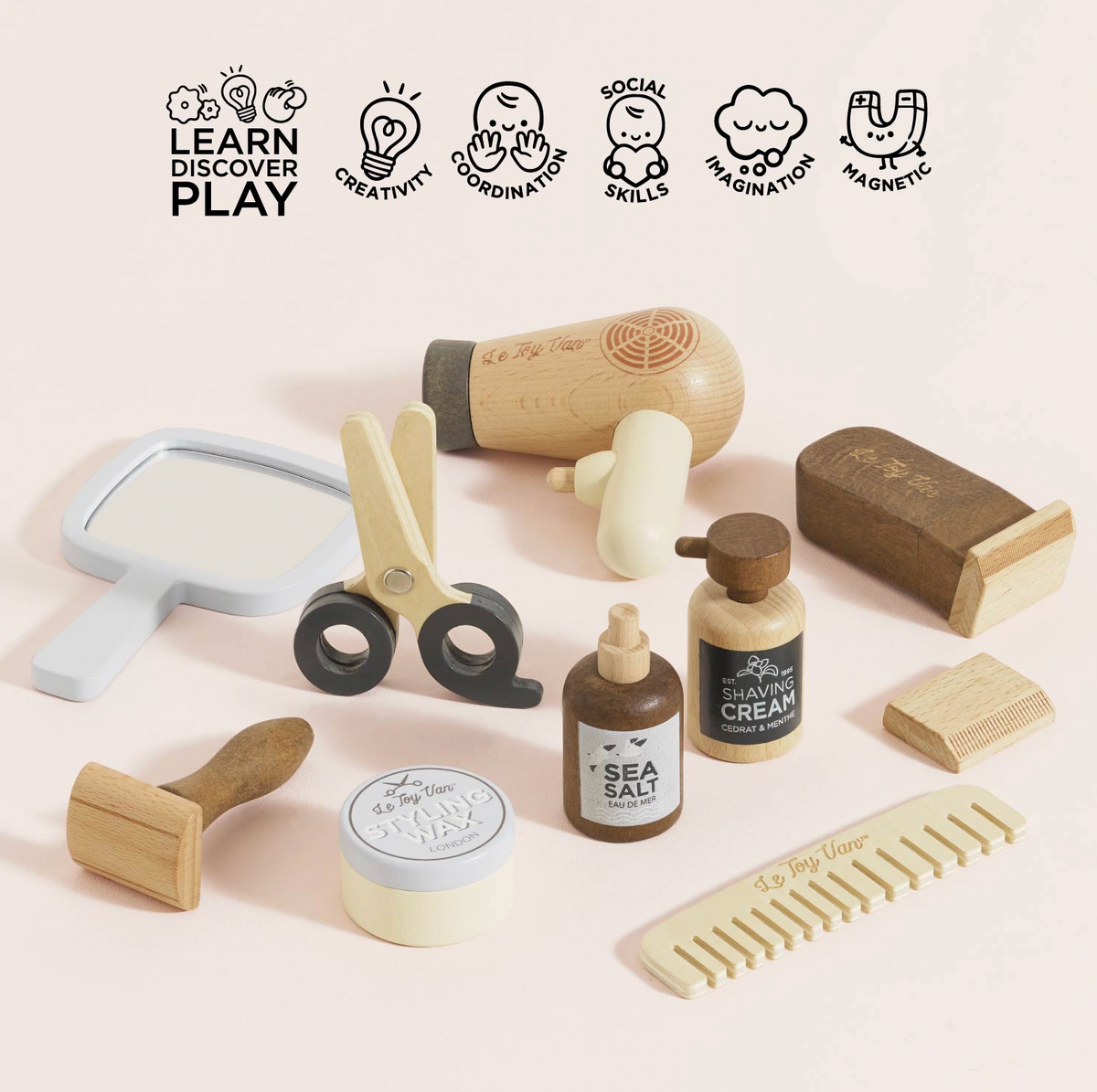 Wooden hairdresser and barber role-play set by Le Toy Van, with detailed grooming accessories for imaginative salon play.