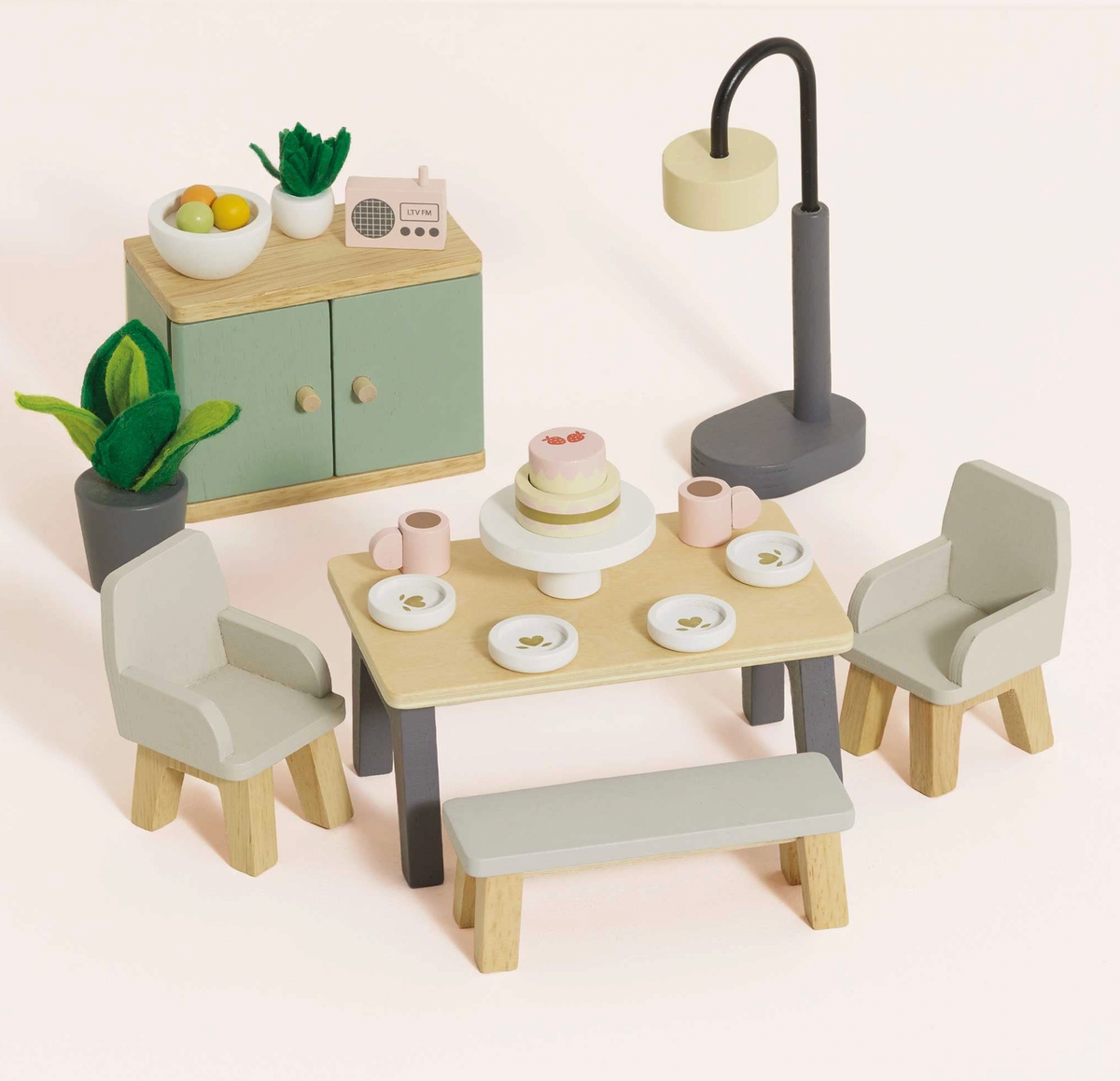 Miniature dining room dolls house furniture by Le Toy Van, an 18-piece wooden set for pretend play.