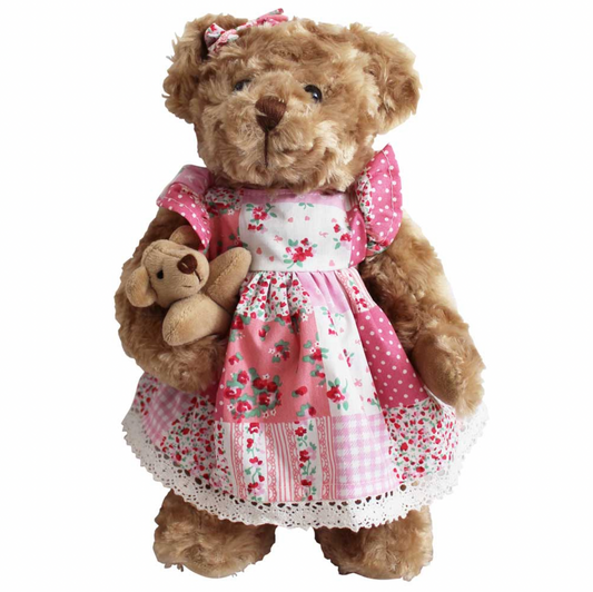 Powell Craft 30cm pink patchwork teddy bear wearing a cotton dress and matching ear bow, with jointed limbs and a tiny velvety teddy companion.