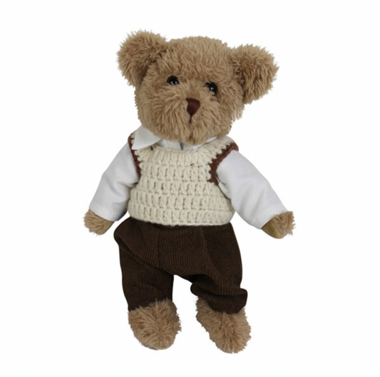 Powell Craft 20cm teddy bear wearing a cream knitted tank top and cream shirt with brown cord trousers.