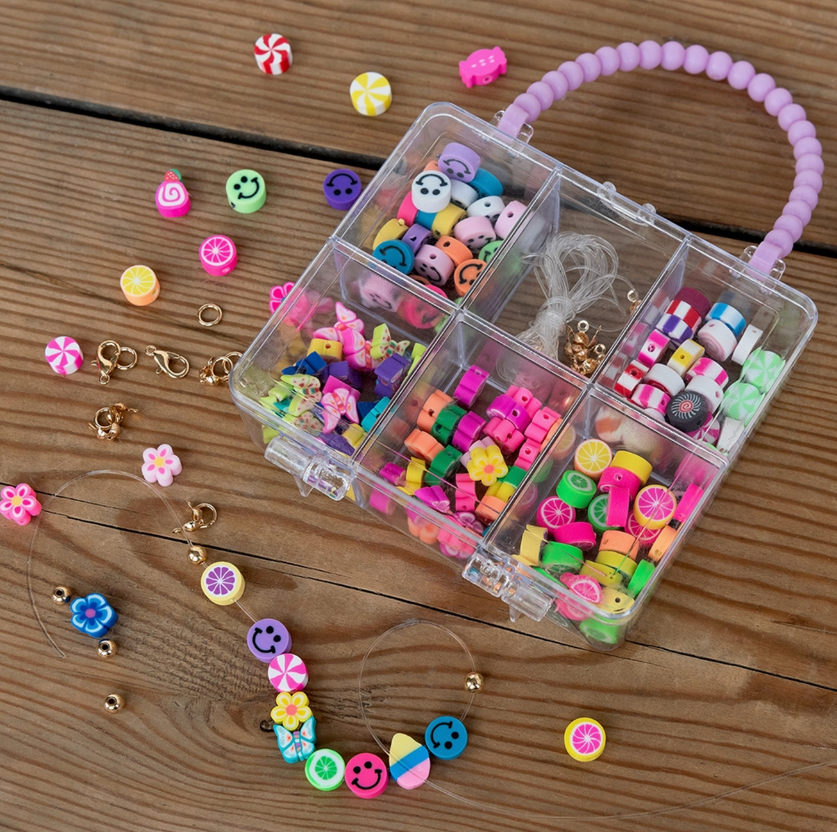 Rex London bead craft set for making personalised bracelets and necklaces, with assorted bead shapes and designs, hooks, clasps and elastic.