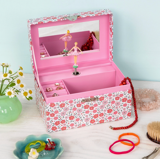 White Tilde floral musical jewellery box by Rex London with five slots for rings or earrings and a main jewellery compartment.