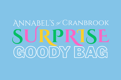 Text graphic reading 'ANNABEL'S CRANBROOK SURPRISE GOODY BAG' on a light blue background, with 'SURPRISE' in large multicolored letters and the rest in white.