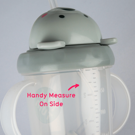 Gray sippy cup with measurement markings. TIPPY CUP WITH STRAW AND FLIP TOP LEAKPROOF LID- KEV KOALA | TUM TUM