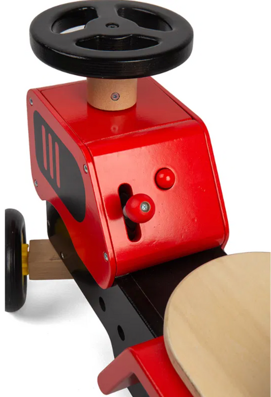 Red toy car with black wheels. TODDLER RIDE ON WOODEN TRACTOR - RED | BIGJIGS