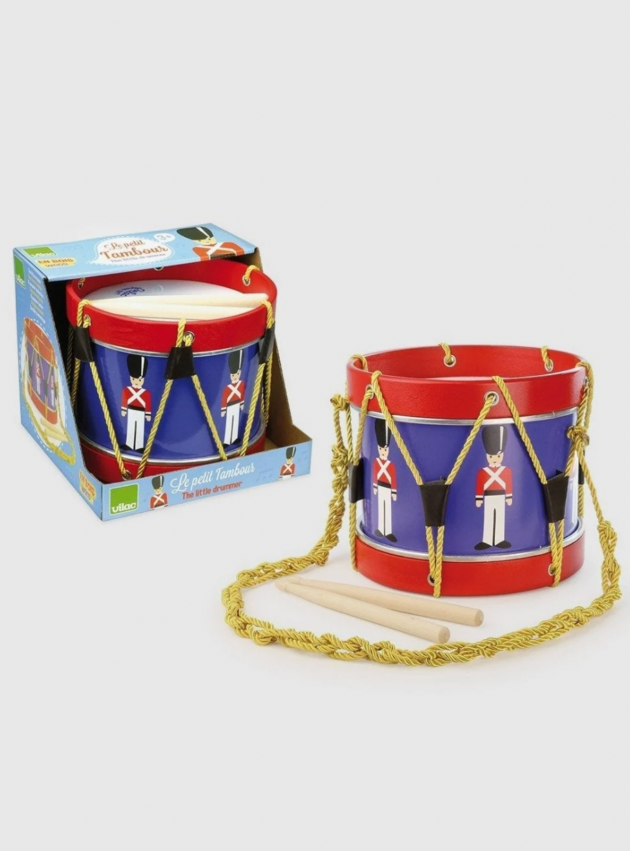 Children's drum set with red, blue, and white design. TRADITIONAL TOY DRUM - THE LITTLE DRUMMER | VILAC