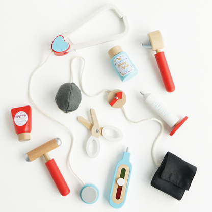 Set of colorful wooden toys on a white background. VINTAGE DOCTOR ROLEPLAY KIT | LE TOY VAN