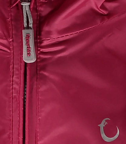 Close-up of a red jacket with a zipper and brand logo. WATERPROOF TODDLER ALL-IN-ONE PACKASUITS - PINK | HIPPYCHICK 