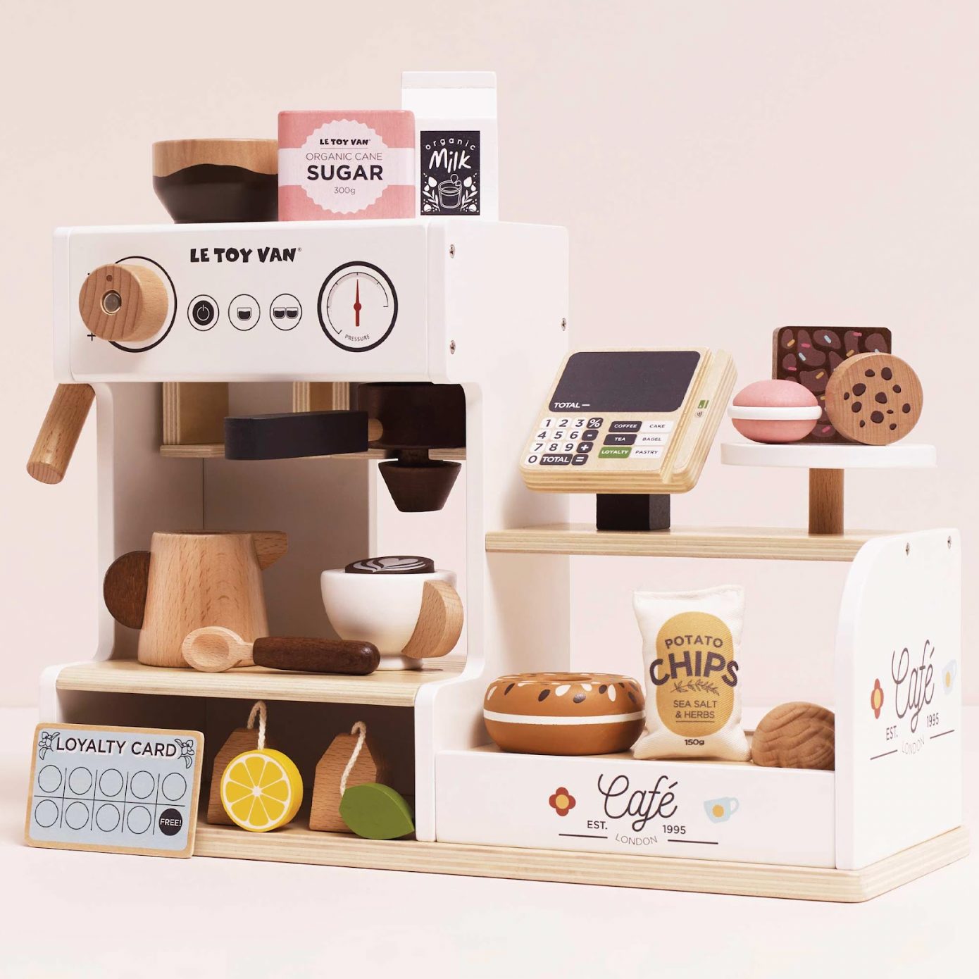 Toy coffee shop set with various items on a white background. WOODEN BARISTA CAFE SHOP | LE TOY VAN
