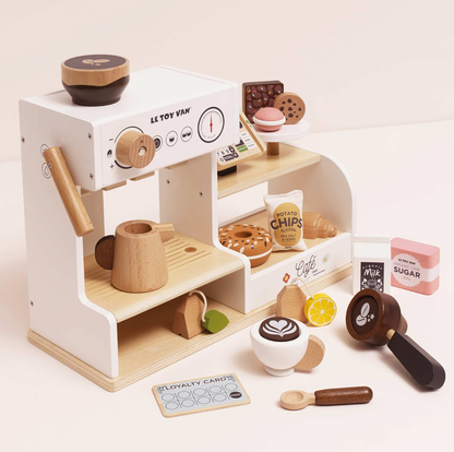 Wooden toy coffee shop set with various items on a white background. WOODEN BARISTA CAFE SHOP | LE TOY VAN