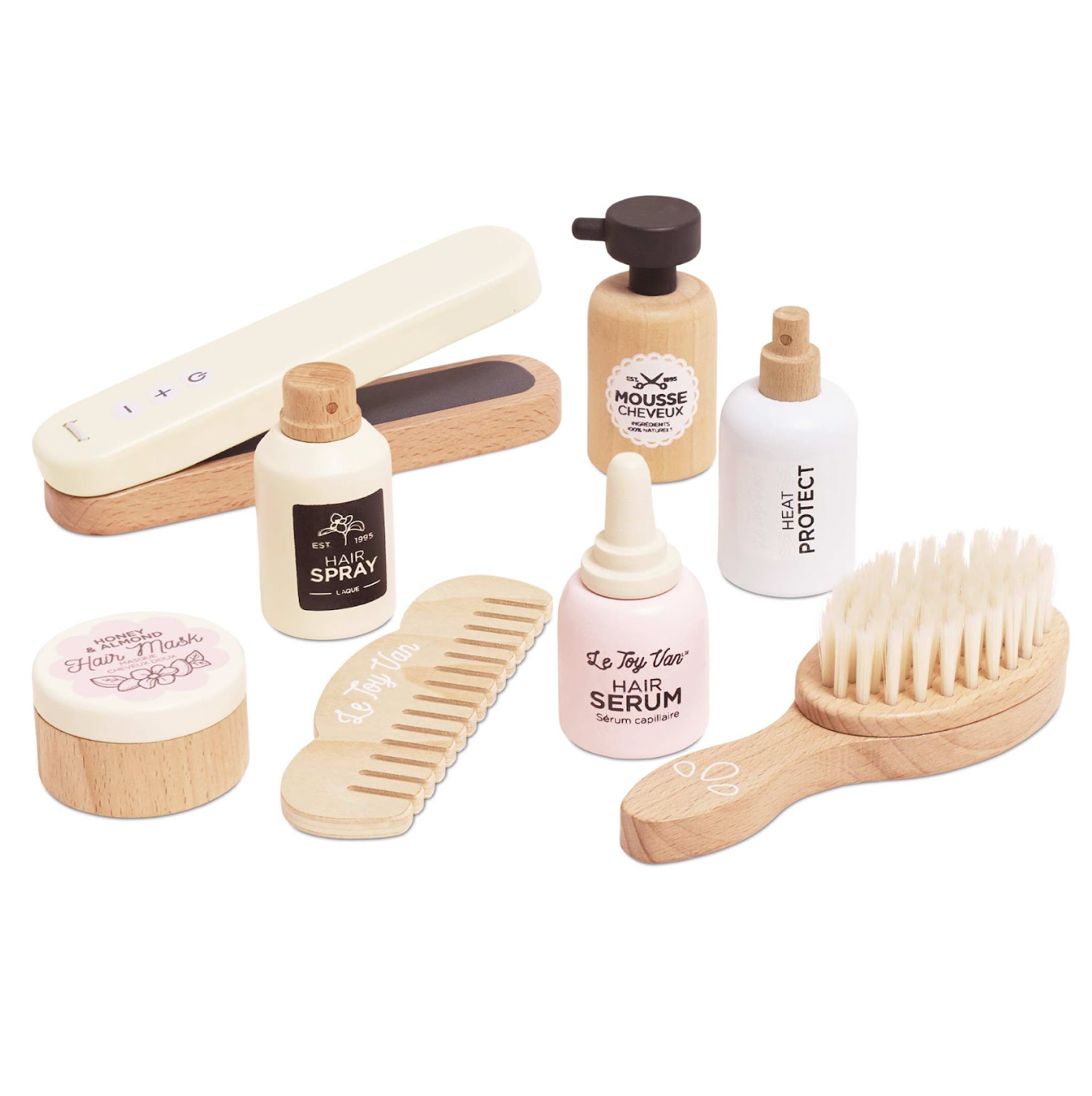 Collection of hair care products including bottles, a comb, and a brush on a white background. WOODEN HAIR STRAIGHTENERS & ACCESSORIES SET | LE TOY VAN