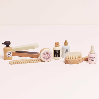 Collection of skincare and hair care products on a white background. WOODEN HAIR STRAIGHTENERS & ACCESSORIES SET | LE TOY VAN