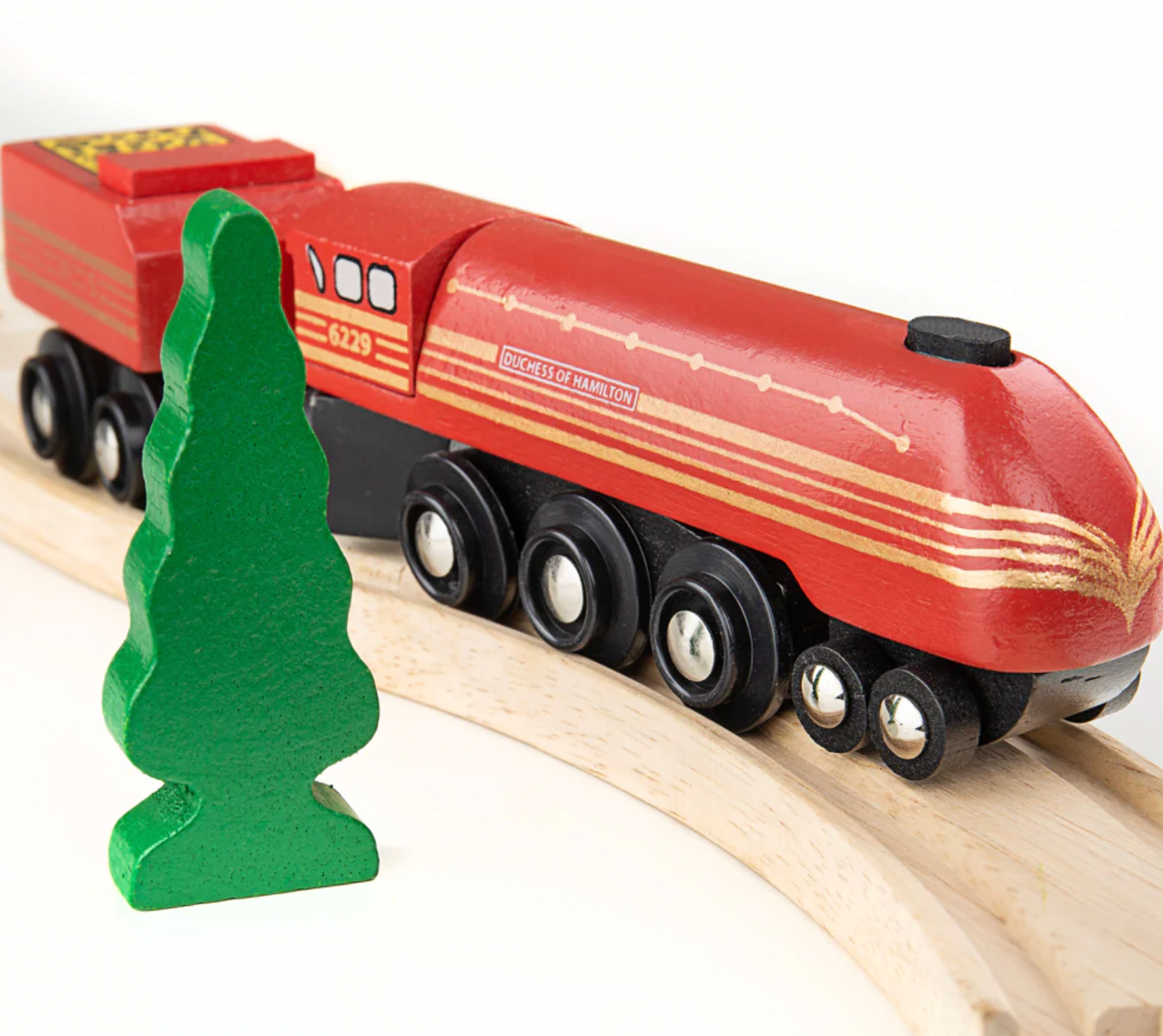 Wooden toy train with a green tree. WOODEN HERITAGE COLLECTION DUCHESS OF HAMILTON | BIGJIGS RAIL