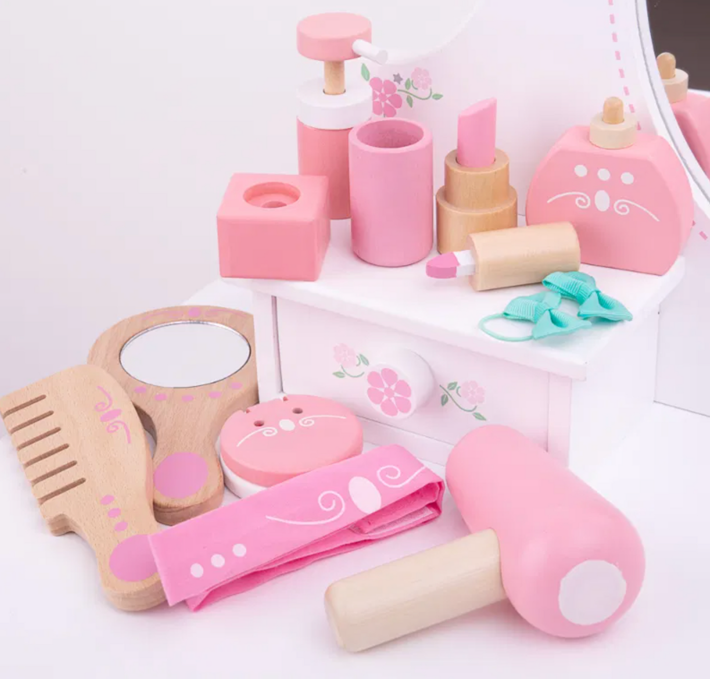 Set of pink and beige toy beauty items on a white background WOODEN PLAY VANITY KIT | BIGJIGS