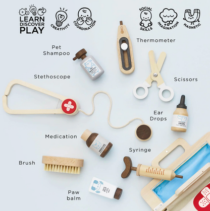 Collection of educational toys and items with labels on a light blue background WOODEN TOY ANIMAL VET SET | LE TOY VAN