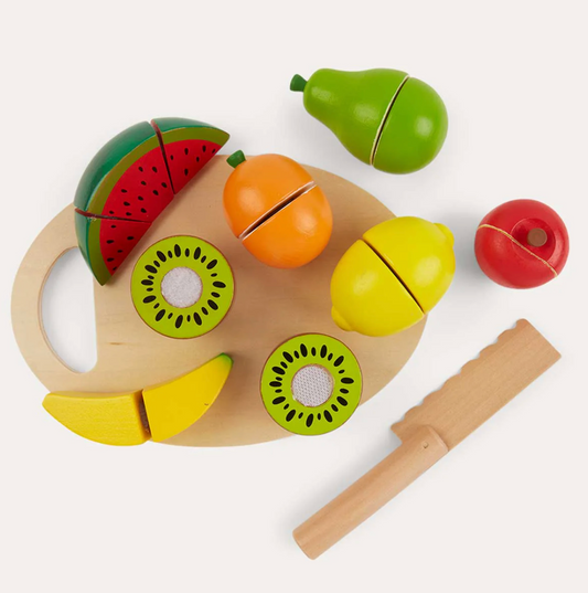Wooden toy cutting board with colorful fruit pieces. WOODEN PLAY CUTTING FRUIT | CLASSIC WORLD