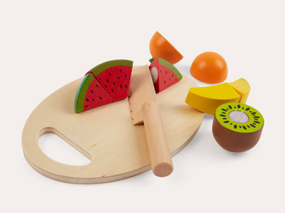 Wooden toy cutting board with sliced fruits. WOODEN TOY CUTTING FRUIT | CLASSIC WORLD