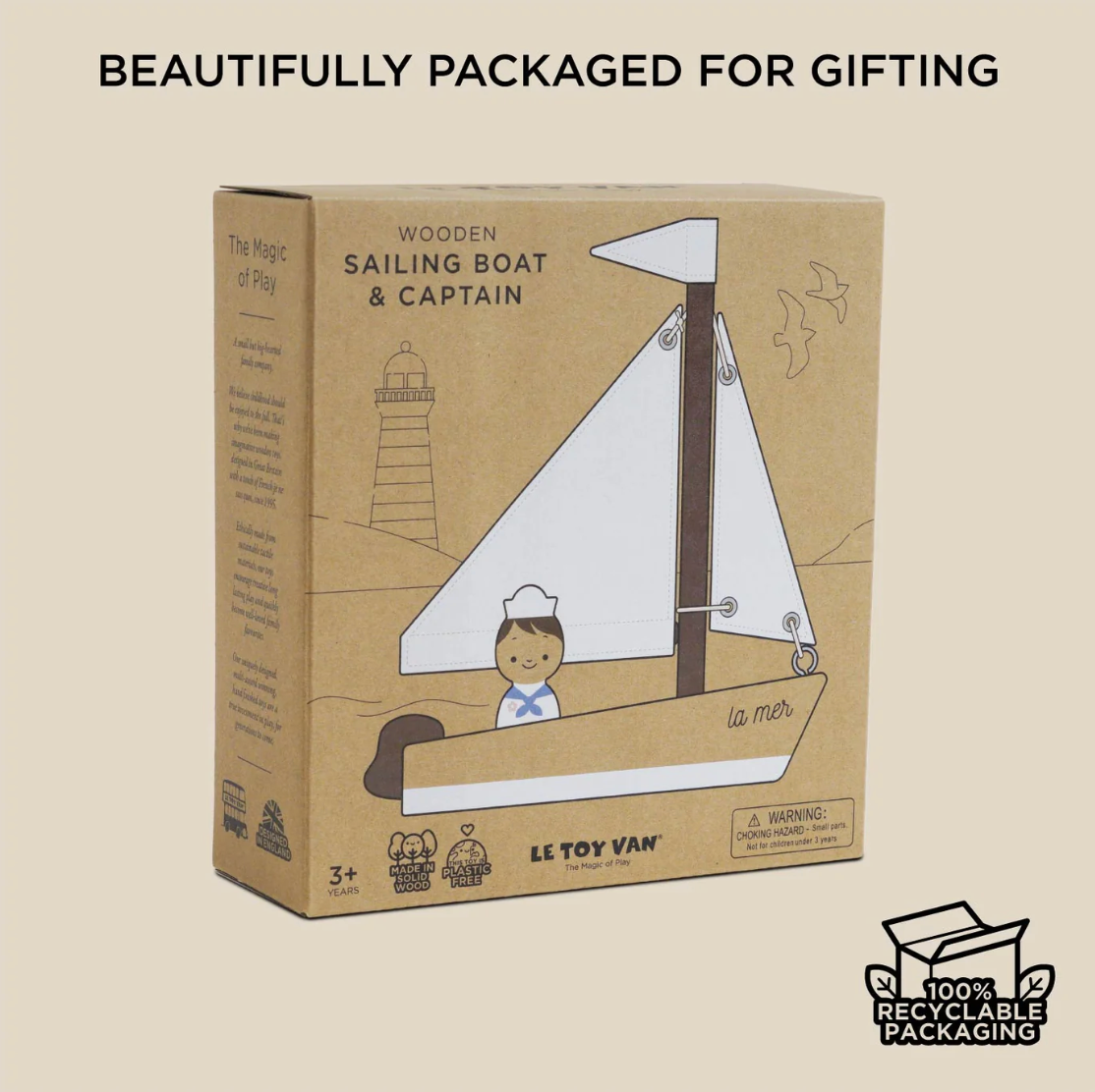 Box packaging of a wooden sailing boat and captain toy set by Le Toy Van, with '100% Recyclable Packaging' label. WOODEN TOY SAILING BOAT & CAPTAIN | LE TOY VAN