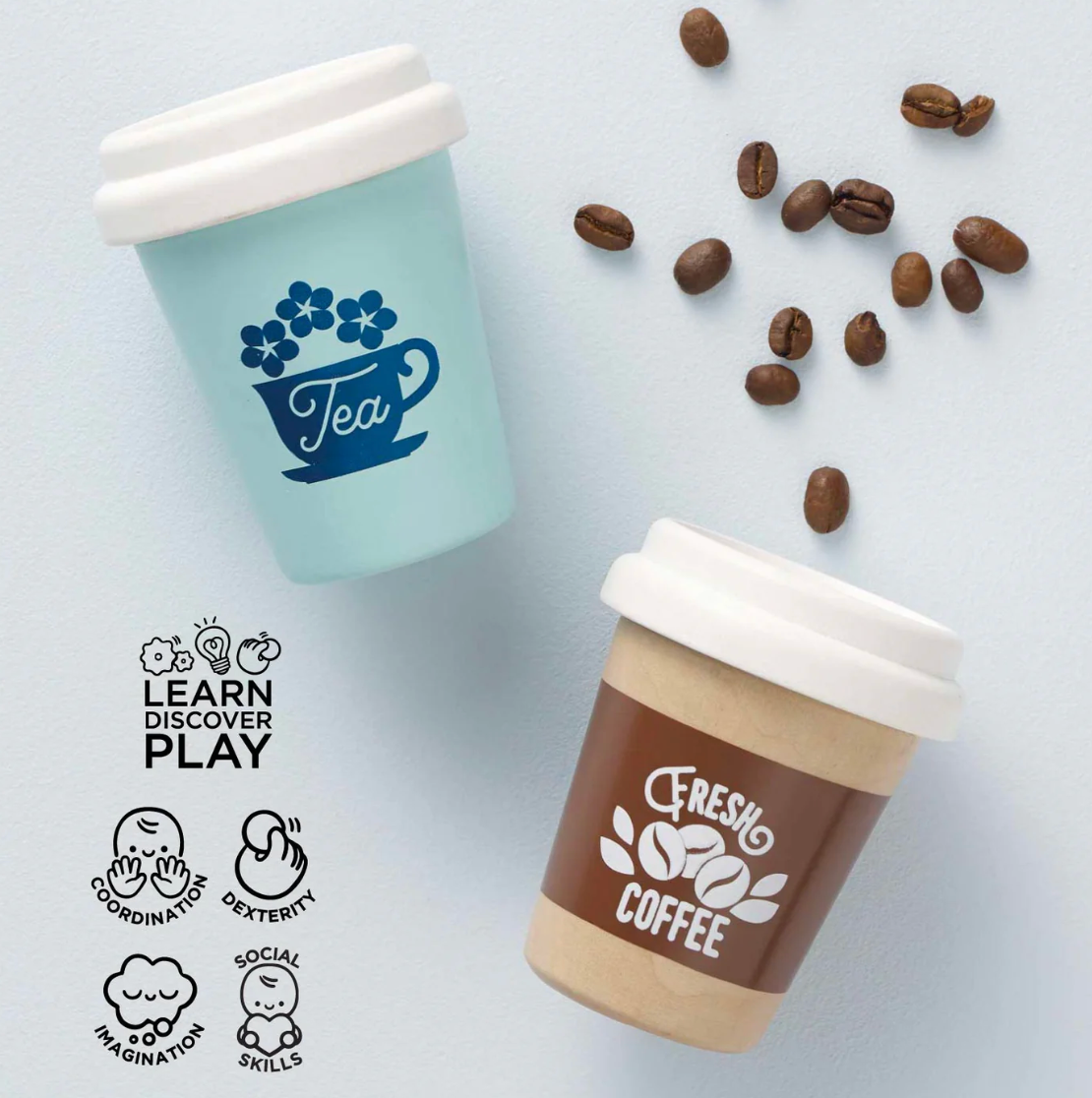 Two coffee cups with 'Tea' and 'Fresh Coffee' text, surrounded by coffee beans on a light gray background. WOODEN TOY TEA & COFFEE RE-USABLE ECO CUP | LE TOY VAN