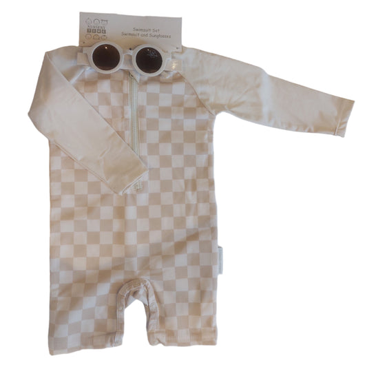 Beige checkered dress on a hanger with a tag on a white surface ZIP-UP TODDLER SWIMSUIT WITH SUNGLASSES SET - CHEQUERED SAND | NURSERY TIME