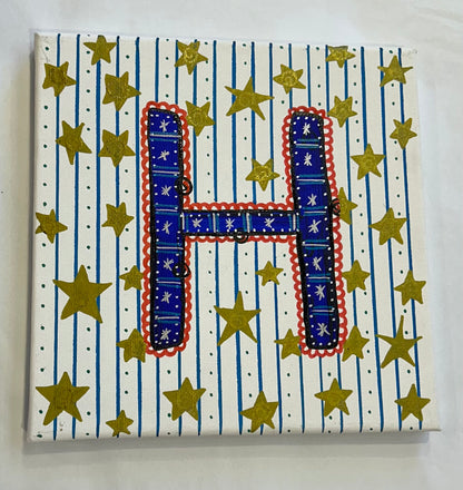 H. Sloan & Daughter hand-painted monogram canvas painting with layered paint technique for a luxury baby nursery or child's bedroom.